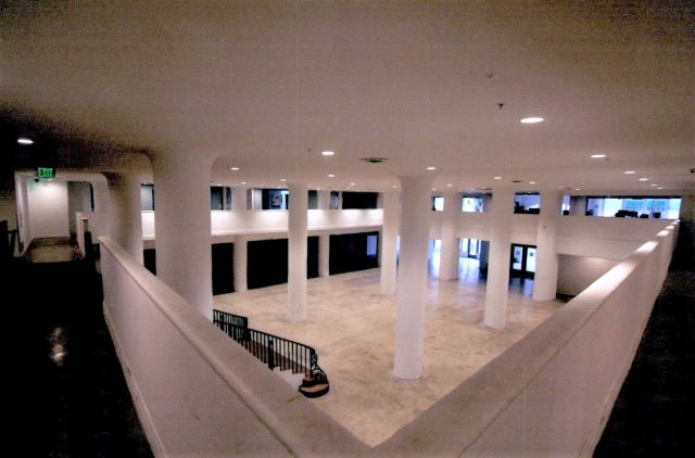 After: Overall view of restored store main floor from mezzanine